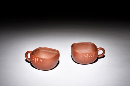 PAIR OF YIXING ZISHA ROUNDED SQUARE TEA CUPS