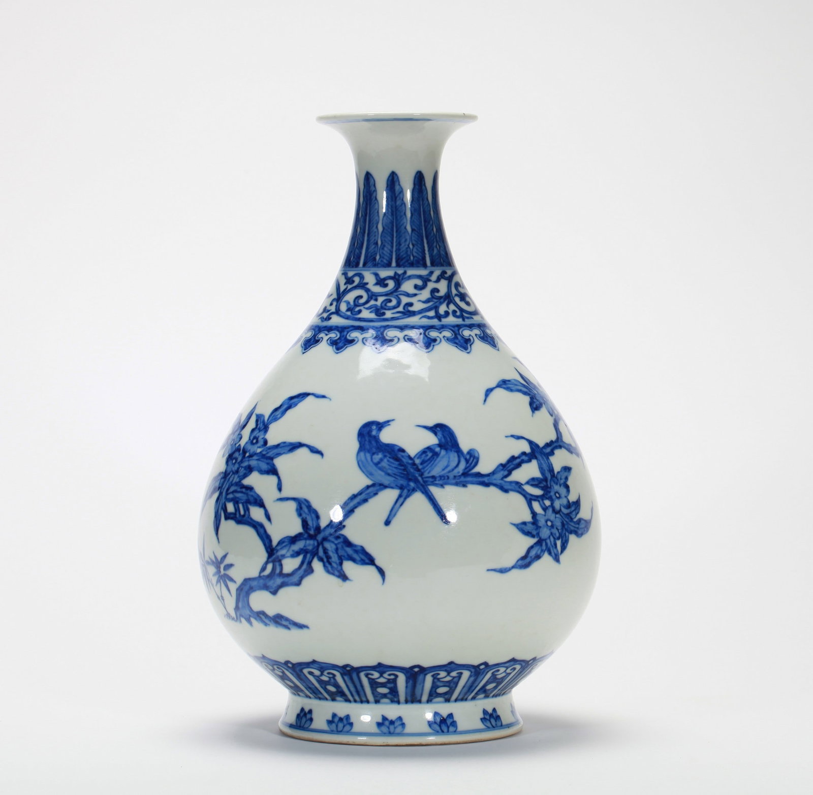 A BLUE AND WHITE FLORAL VASE (1 of 10)