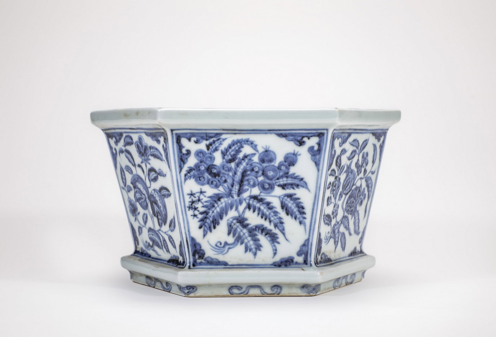A BLUE AND WHITE FLORAL AND FRUIT FLOWER POT (1 of 9)