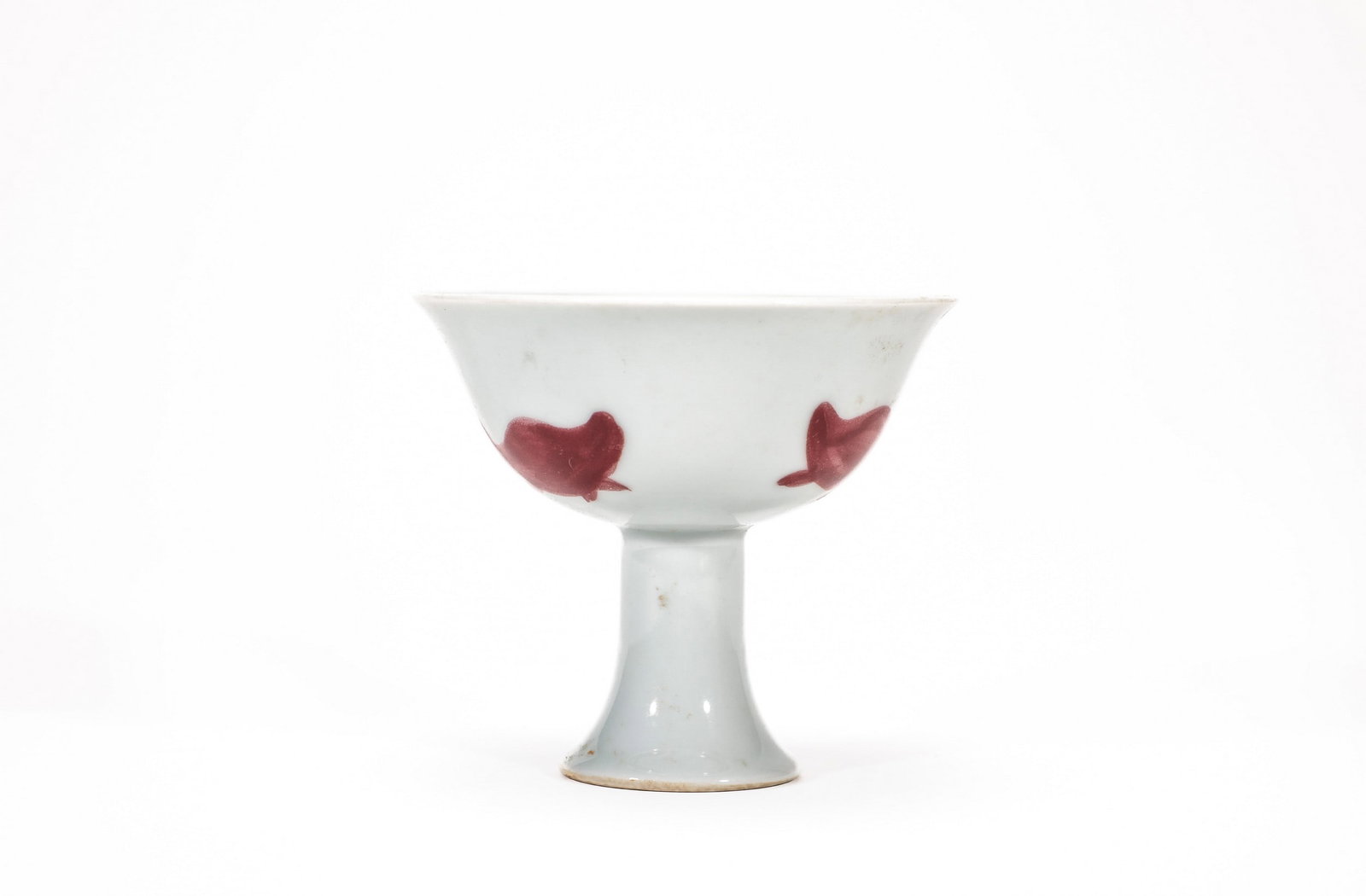 A COPPER-RED GLAZED STEM CUP: 明宣德釉里红高足杯 A copper-red glazed stem cup Ht.9cm Diam.10cm