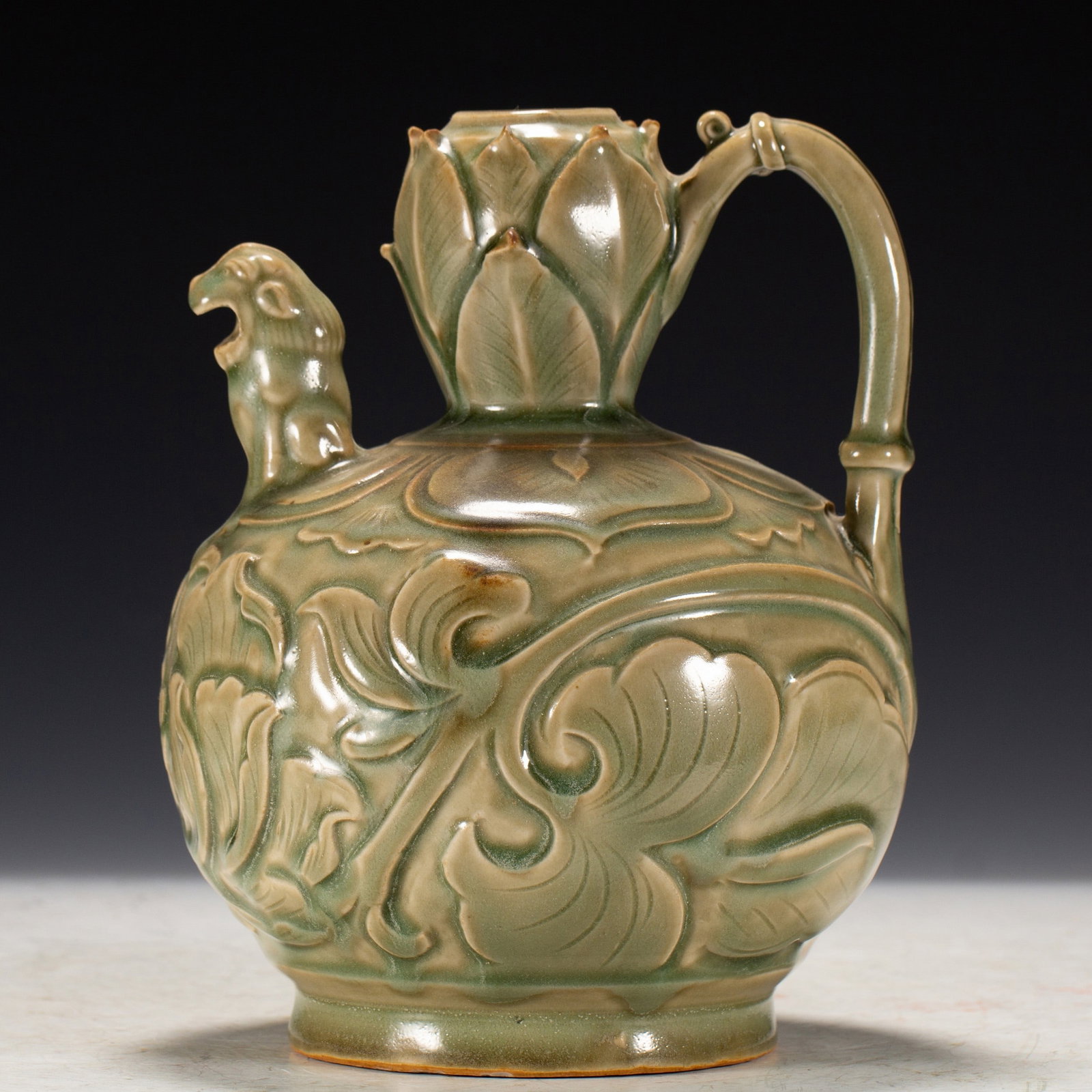 A LONGQUAN POT: 宋 龙泉窑壶 A Longquan pot Ht.22CM