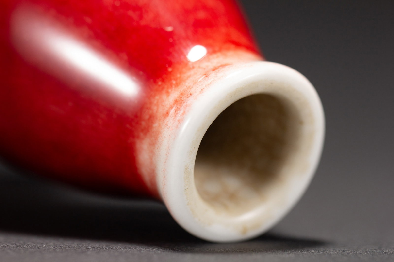 A RED GLAZED VASE - 4