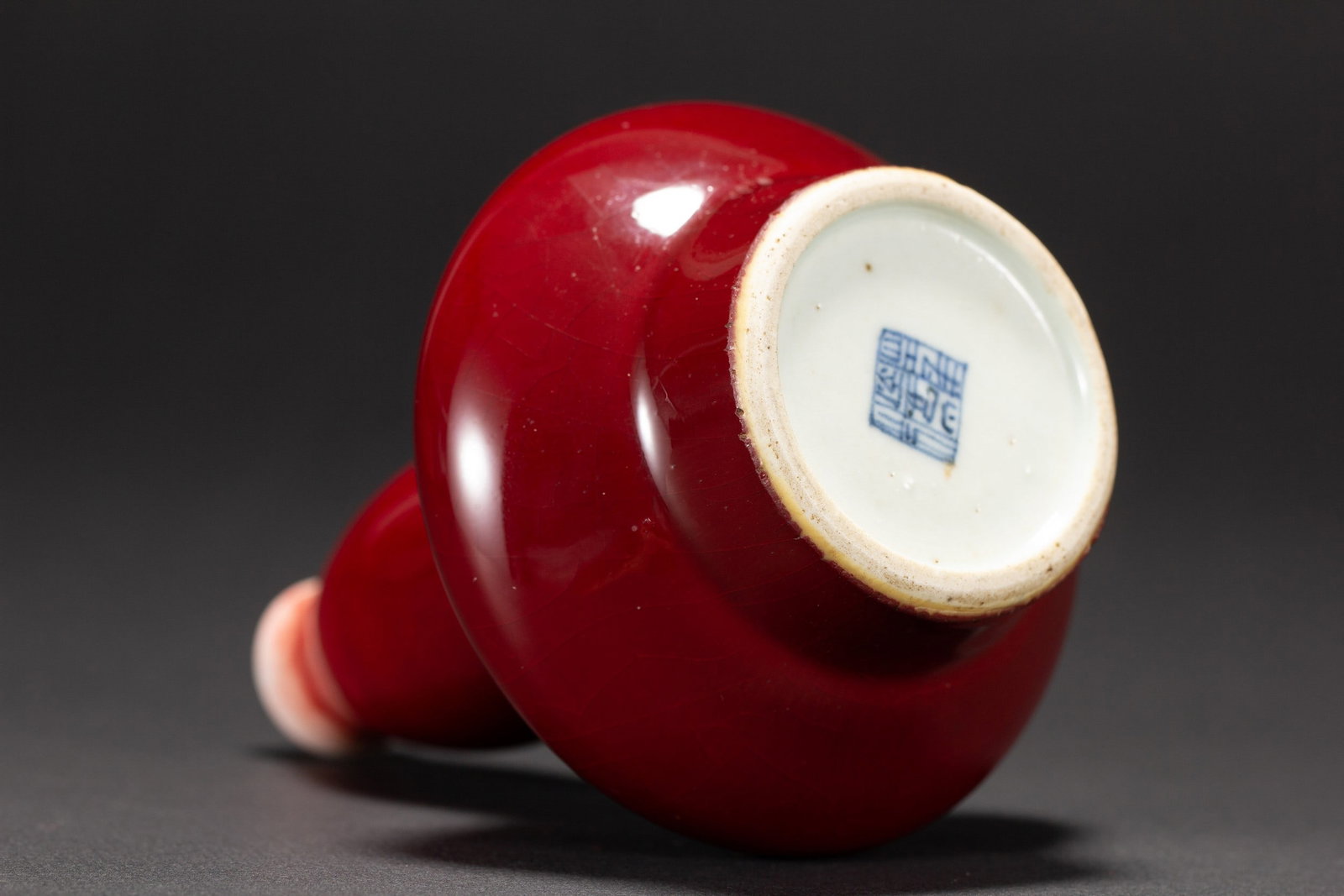 A RED GLAZED VASE - 5