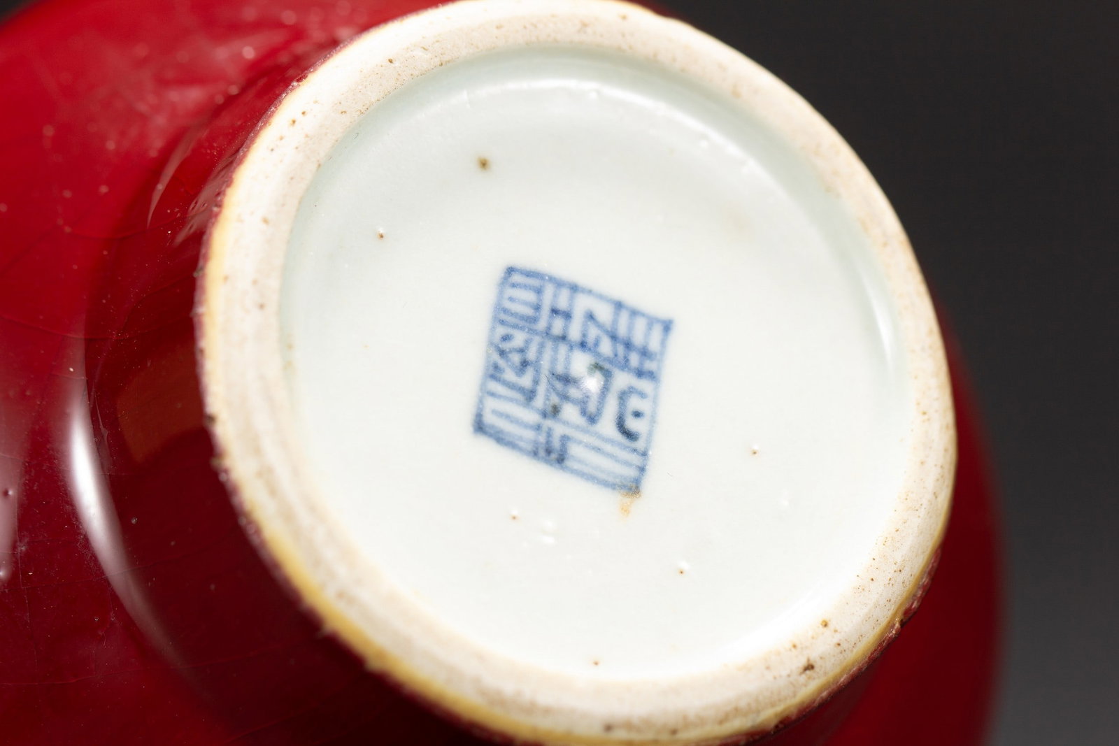 A RED GLAZED VASE - 7