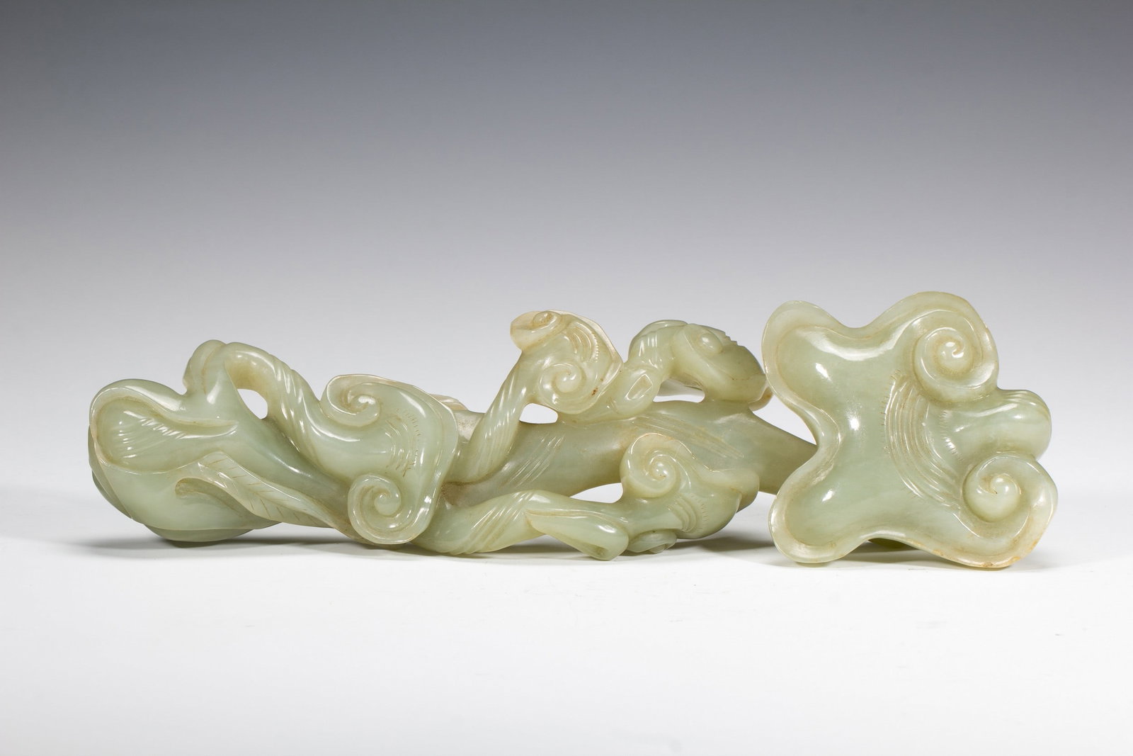 A JADE RUYI: 和田玉如意 A jade ruyi Lg.15CM