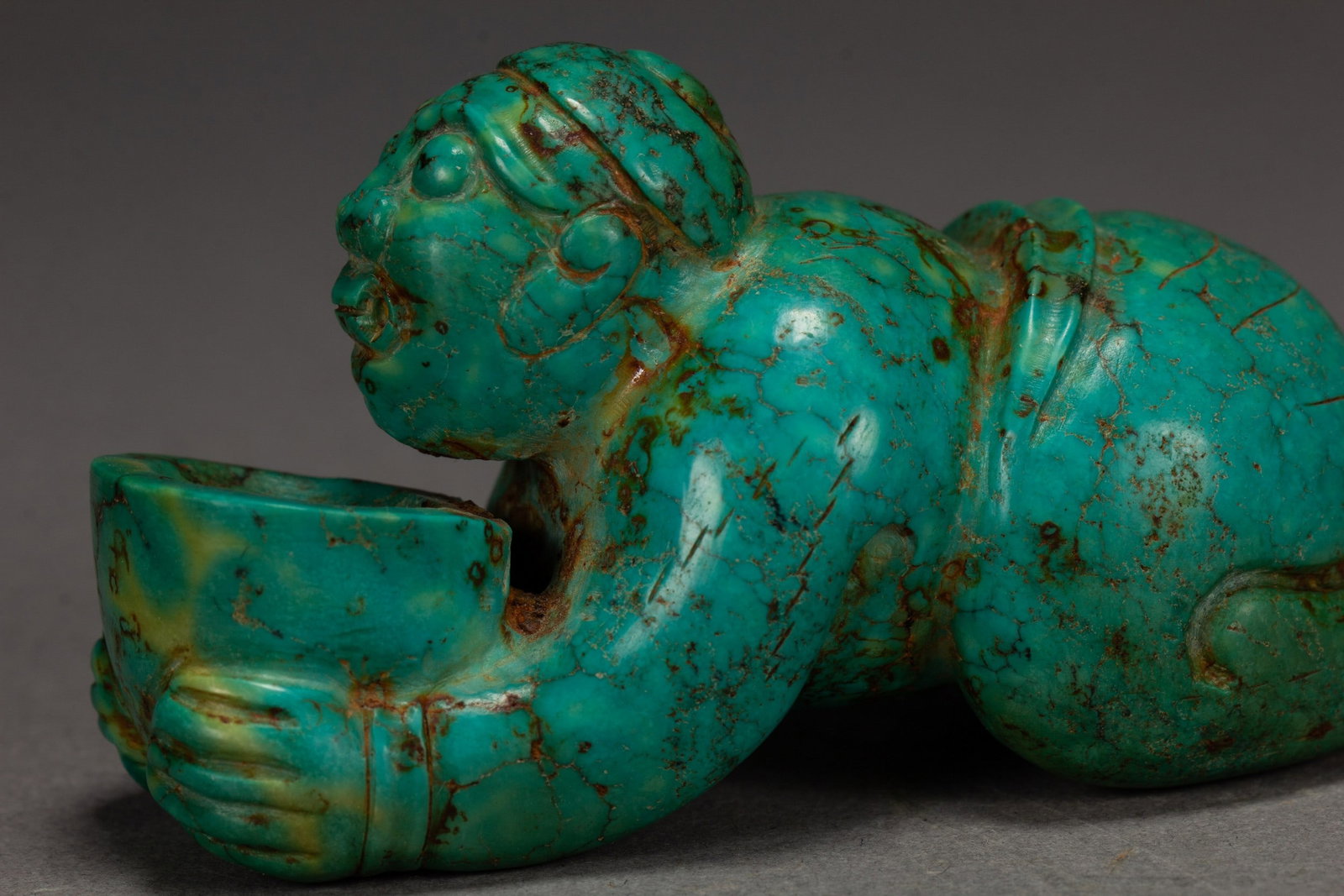 A TURQUOISE FIGURE - 3