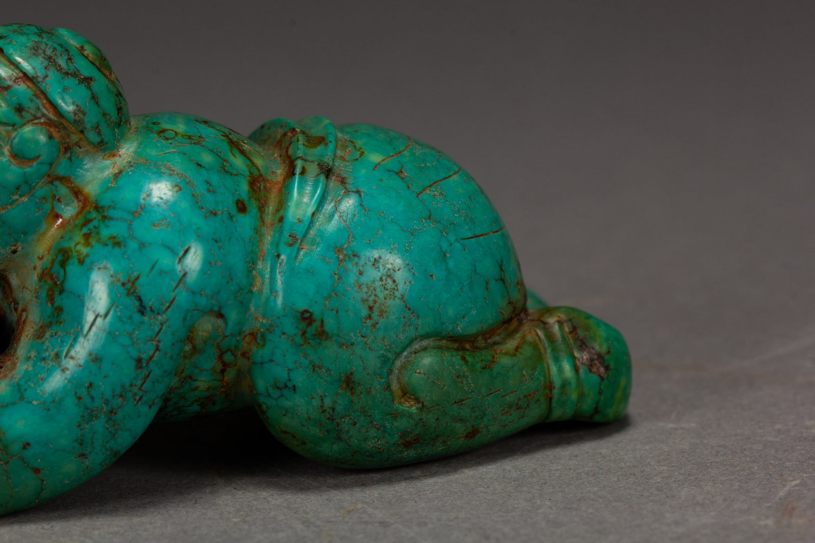 A TURQUOISE FIGURE - 4