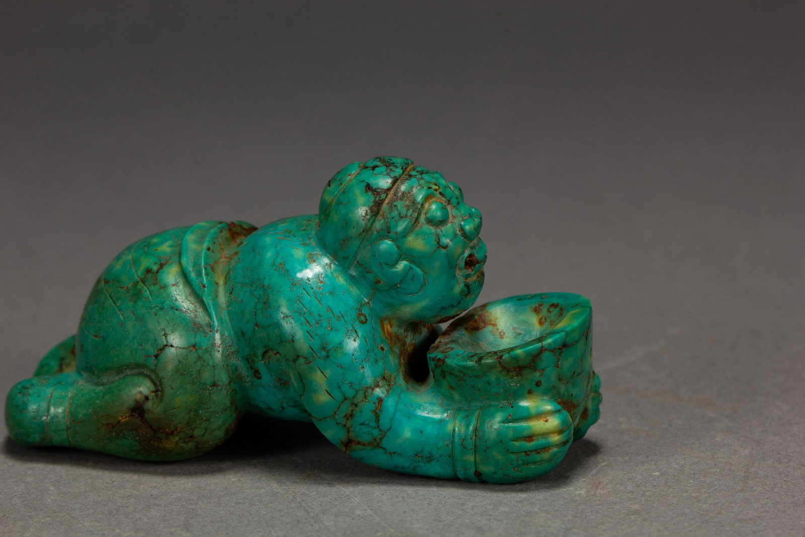 A TURQUOISE FIGURE - 5