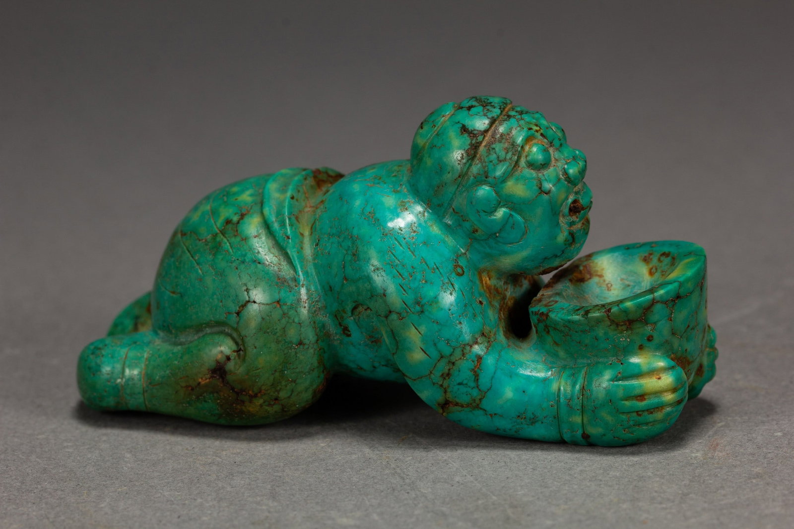 A TURQUOISE FIGURE - 6