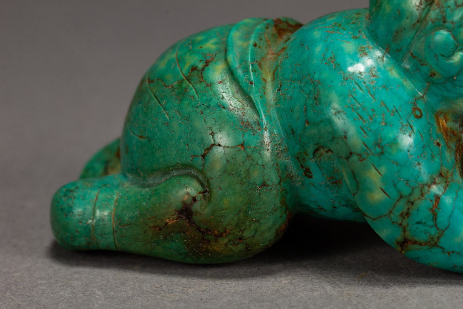 A TURQUOISE FIGURE - 8