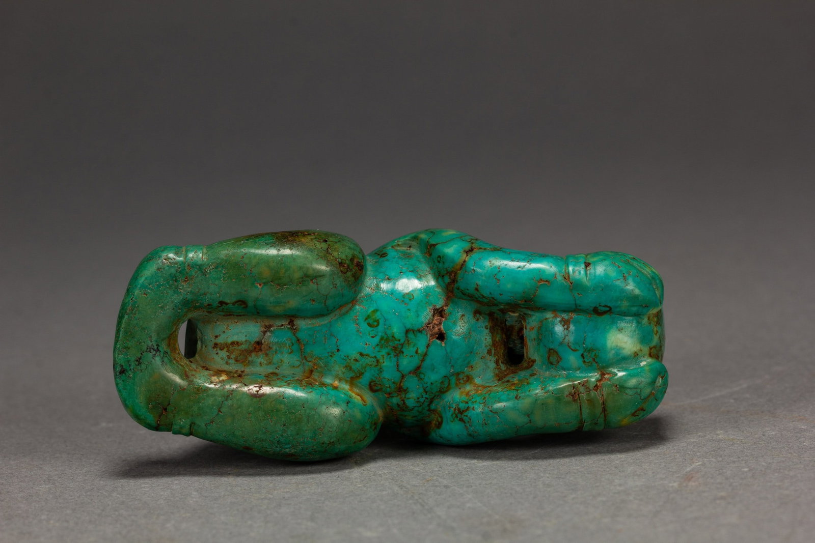 A TURQUOISE FIGURE - 9