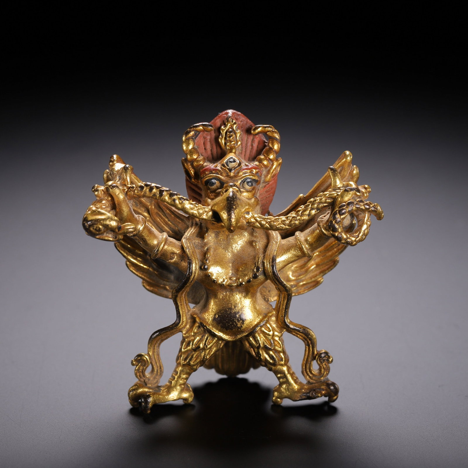 A GILT-BRONZE FIGURE OF BUDDHA: 铜鎏金佛像 A gilt-bronze figure of Buddha Ht.6CM