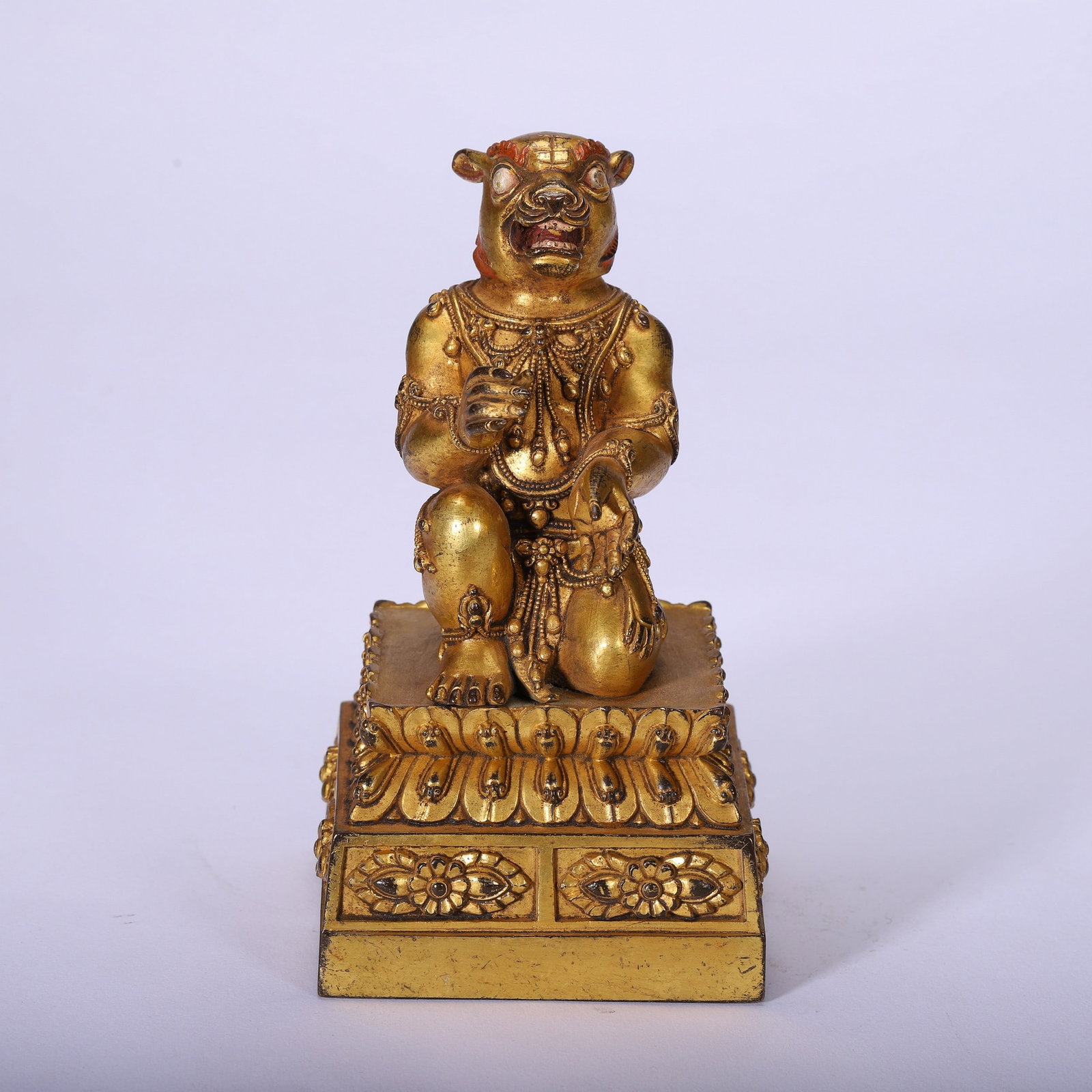 A GILT-BRONZE FIGURE OF BUDDHA: 铜鎏金佛像 A gilt-bronze figure of Buddha Ht.16CM