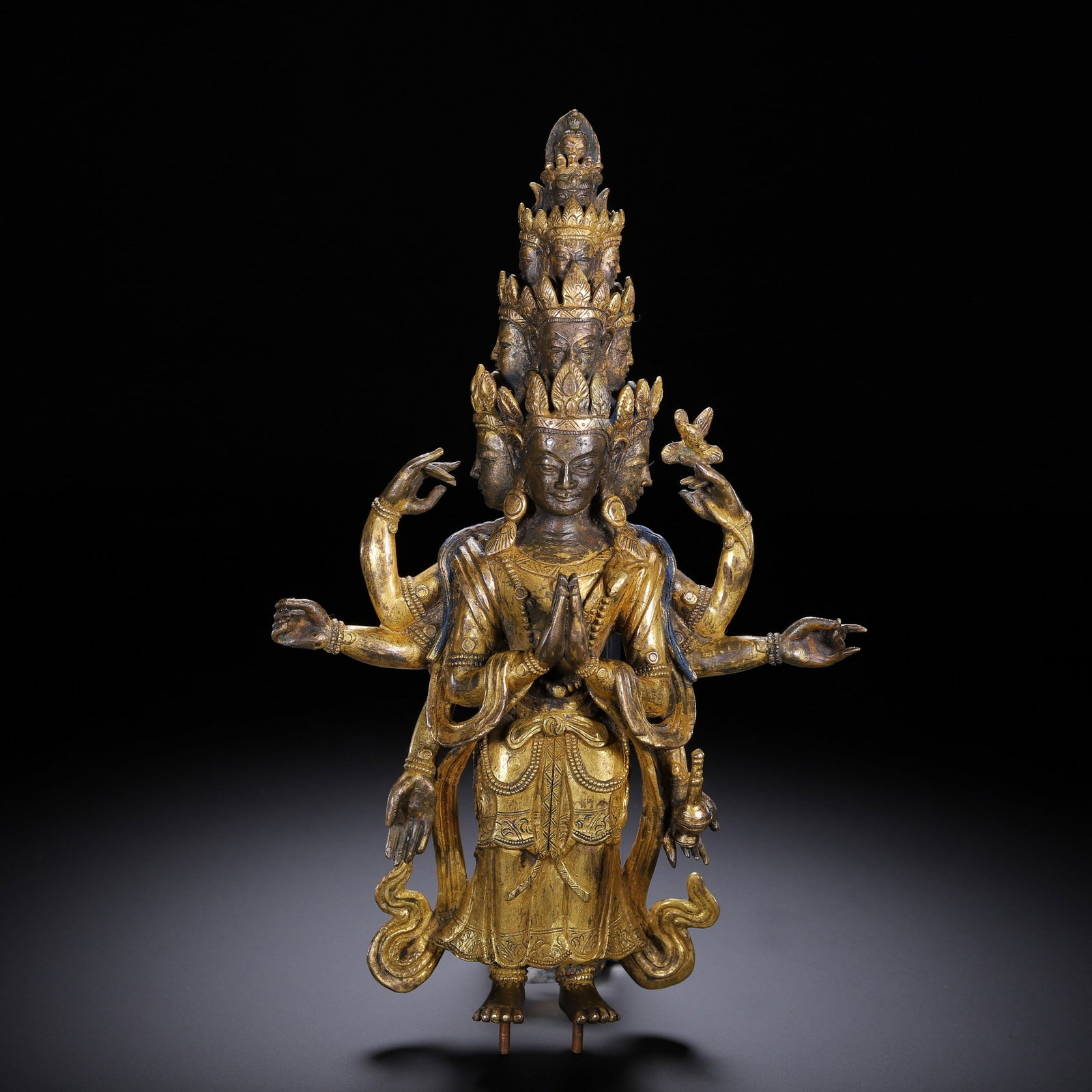 A GILT-BRONZE FIGURE OF BUDDHA (1 of 9)