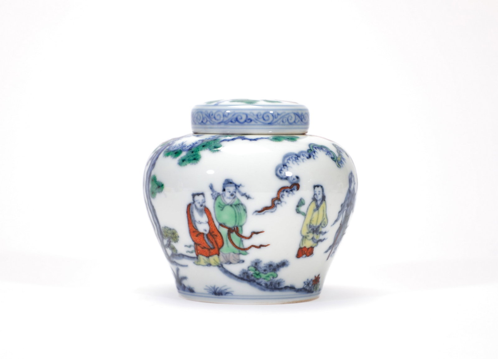 A DOUCAI 'BAXIAN' COVERED JAR: 明成化斗彩八仙人物图盖罐 A doucai 'baxian' covered jar Ht.7.5cm