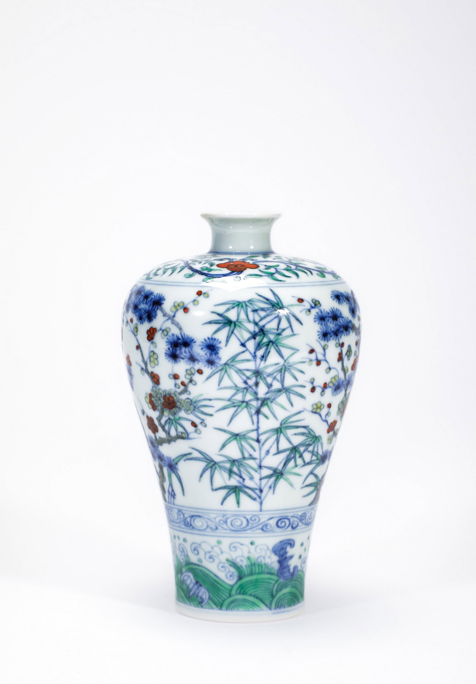 A DOUCAI PLUM BLOSSOM AND BAMBOO MEIPING: 明成化斗彩松竹梅梅瓶 A doucai plum blossom and bamboo meiping Ht.16cm