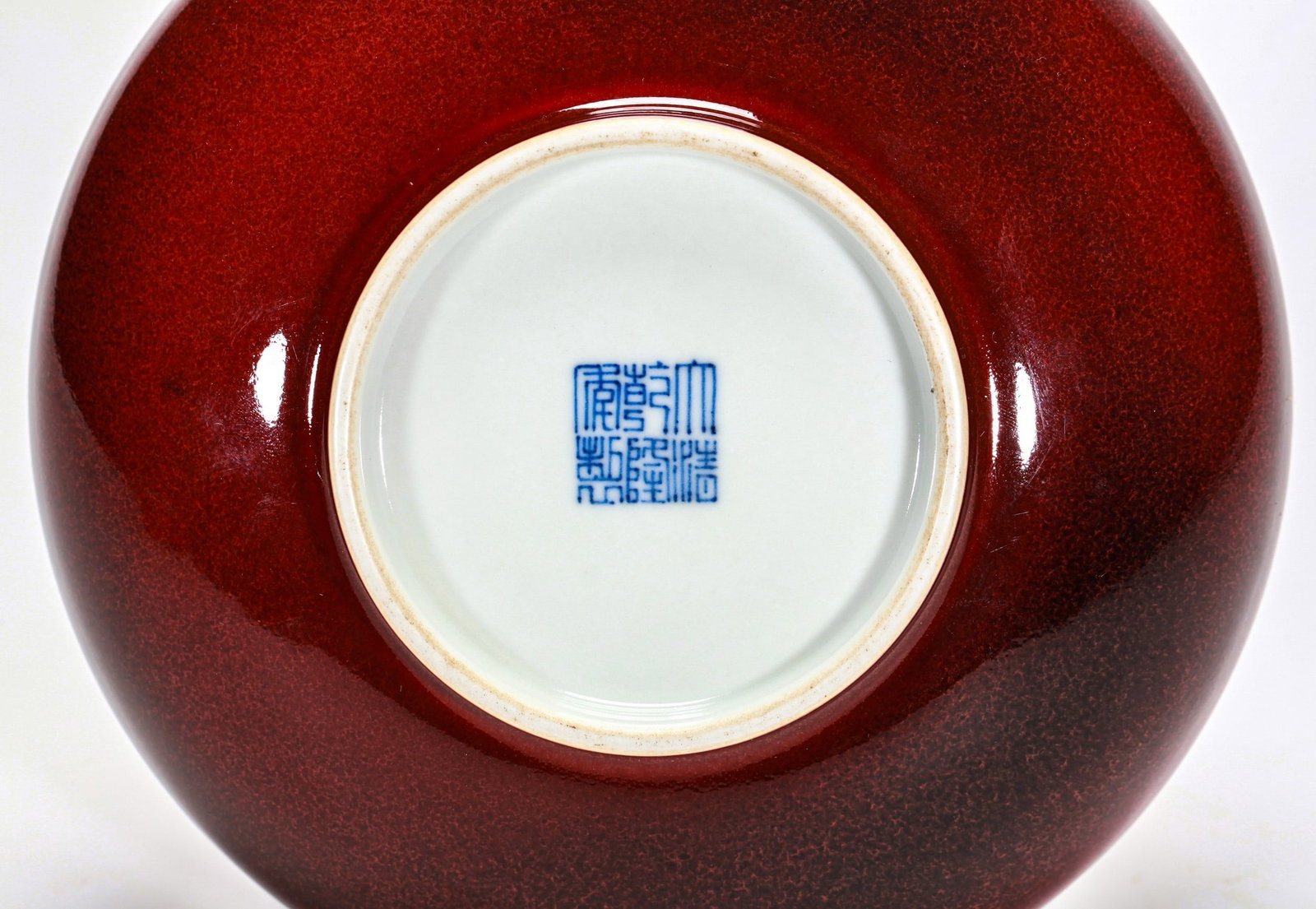 A RED GLAZED DISH - 4