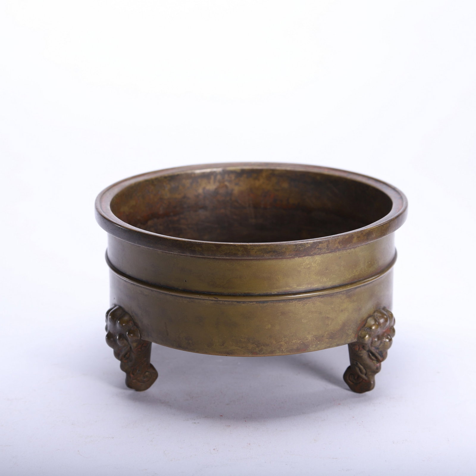 A COPPER TRIPOD INCENSE BURNER: 铜三足炉 A copper tripod incense burner Lg.14cm Ht.8cm