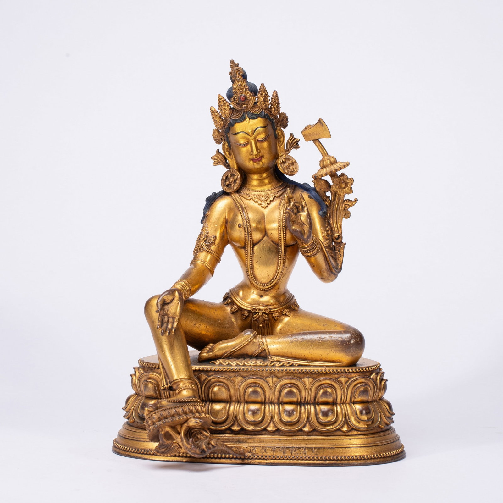 A COPPER GILDED BUDDHA STATUE: 铜鎏金佛像 A copper gilded Buddha statue Ht.21cm