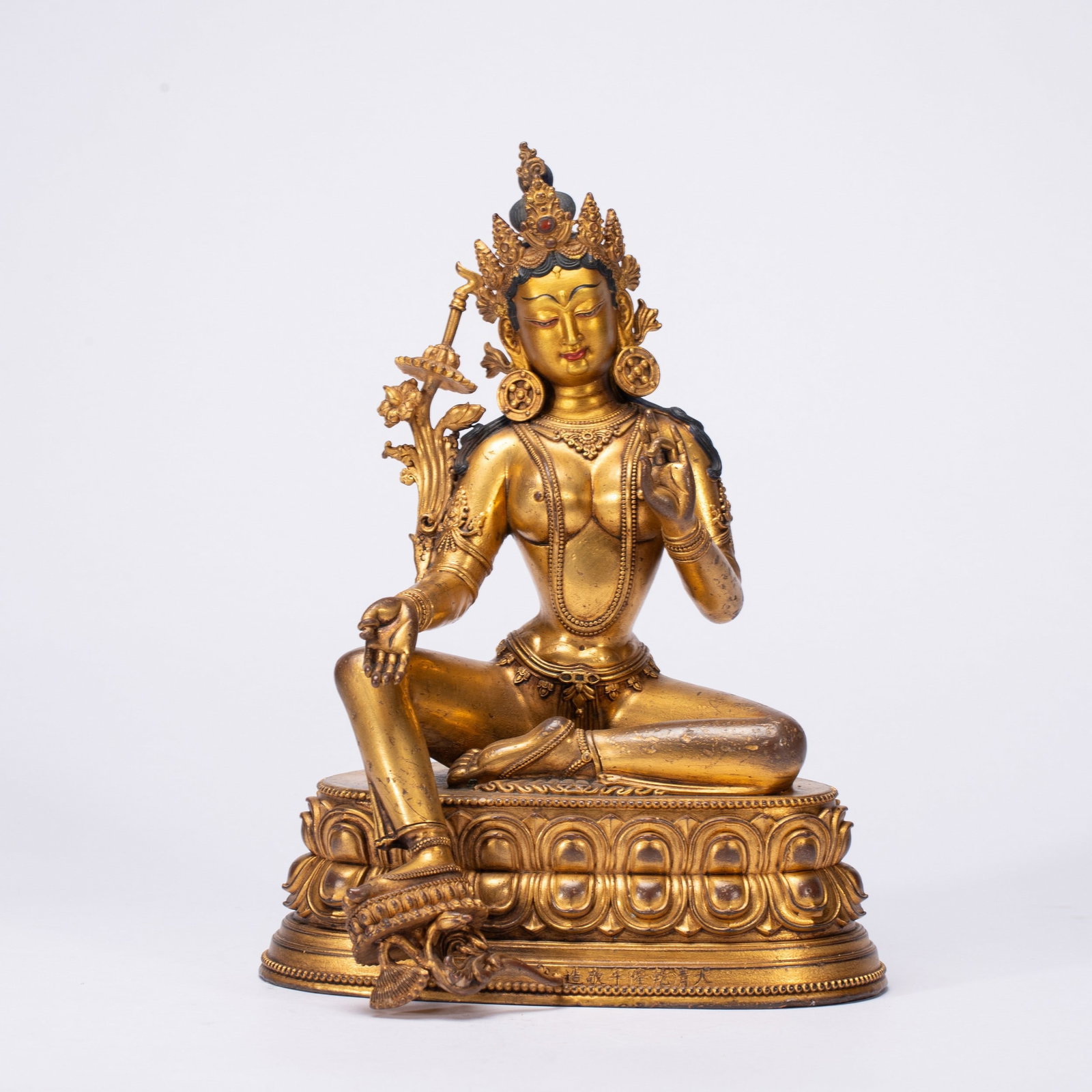 A COPPER GILDED BUDDHA STATUE: 铜鎏金佛像 A copper gilded Buddha statue Ht.21cm