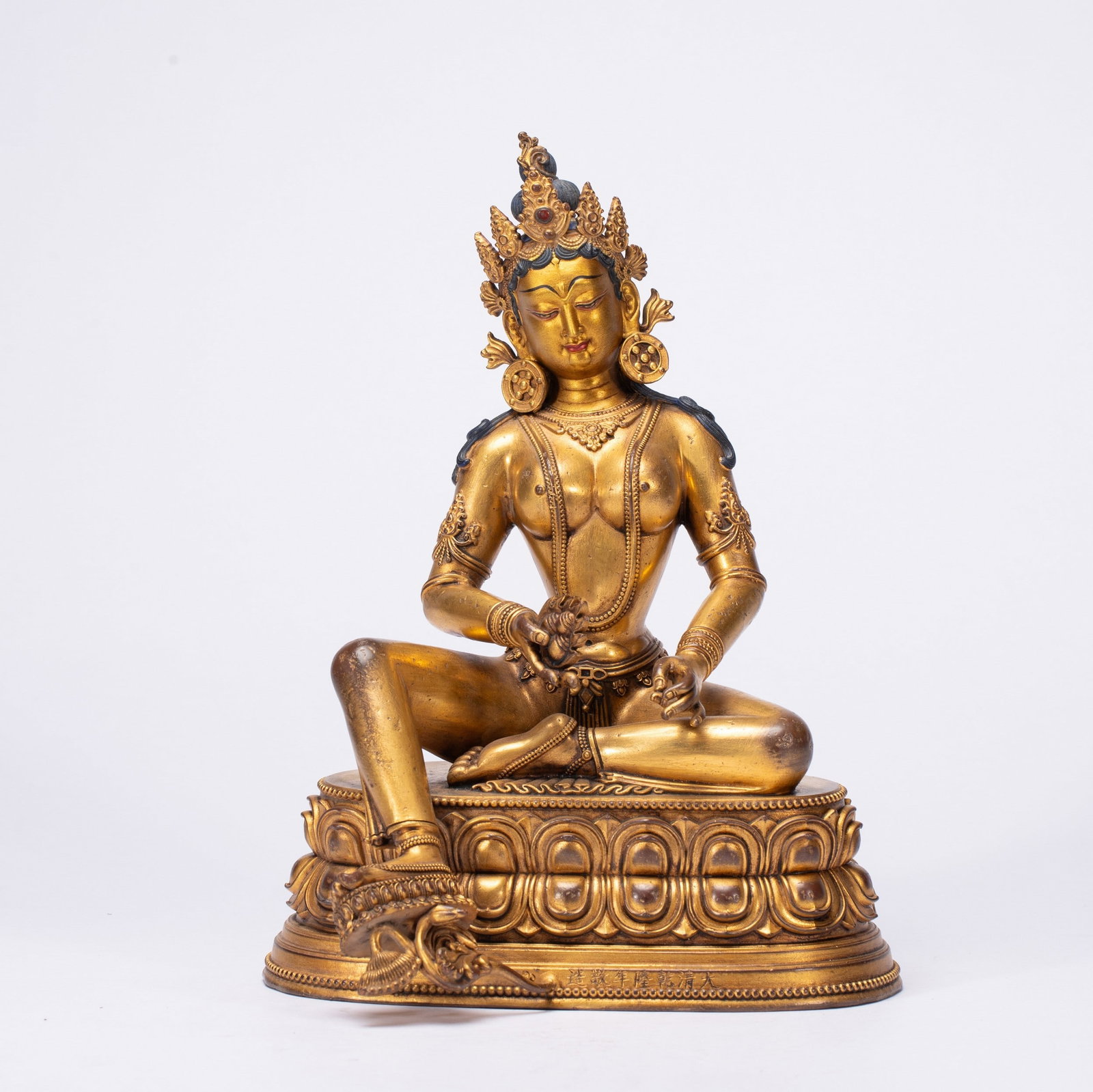 A COPPER GILDED BUDDHA STATUE: 铜鎏金佛像 A copper gilded Buddha statue Ht.21cm