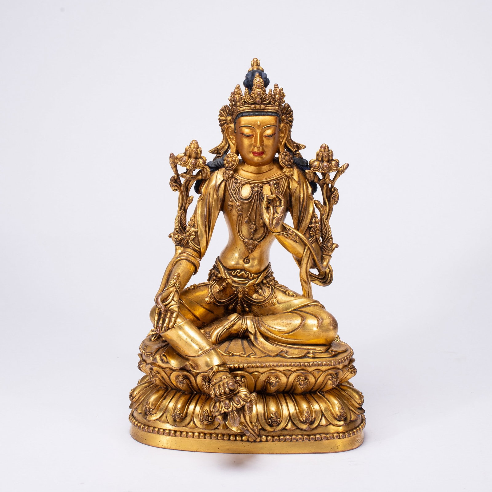 A COPPER GILDED BUDDHA STATUE (1 of 9)
