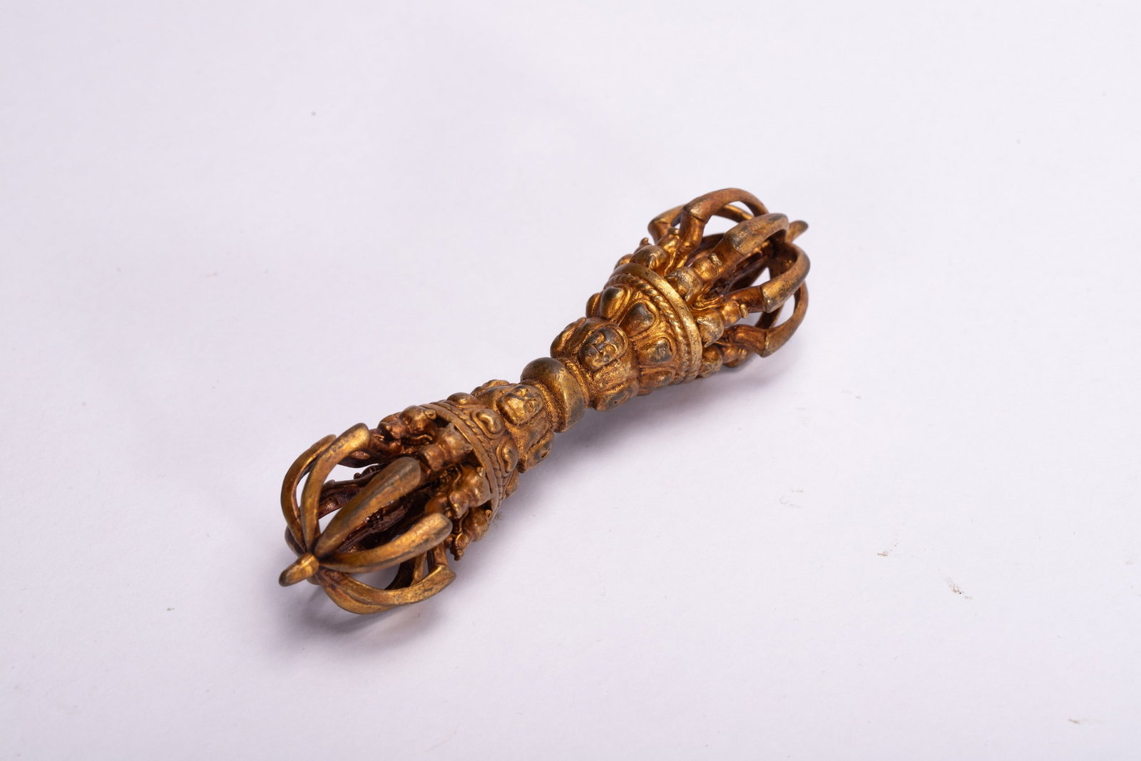 A COPPER GILDED ARTIFACT - 4
