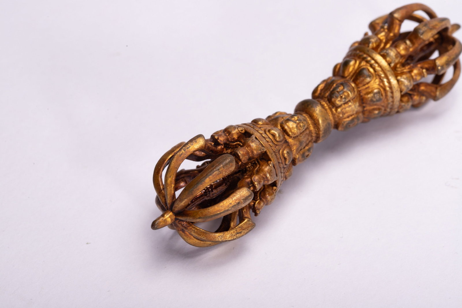 A COPPER GILDED ARTIFACT - 5