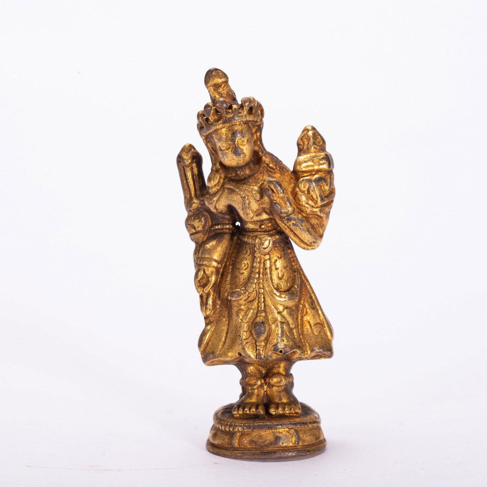A COPPER GILDED BUDDHA STATUE: 铜鎏金佛像 A copper gilded Buddha statue 5.5x2cm