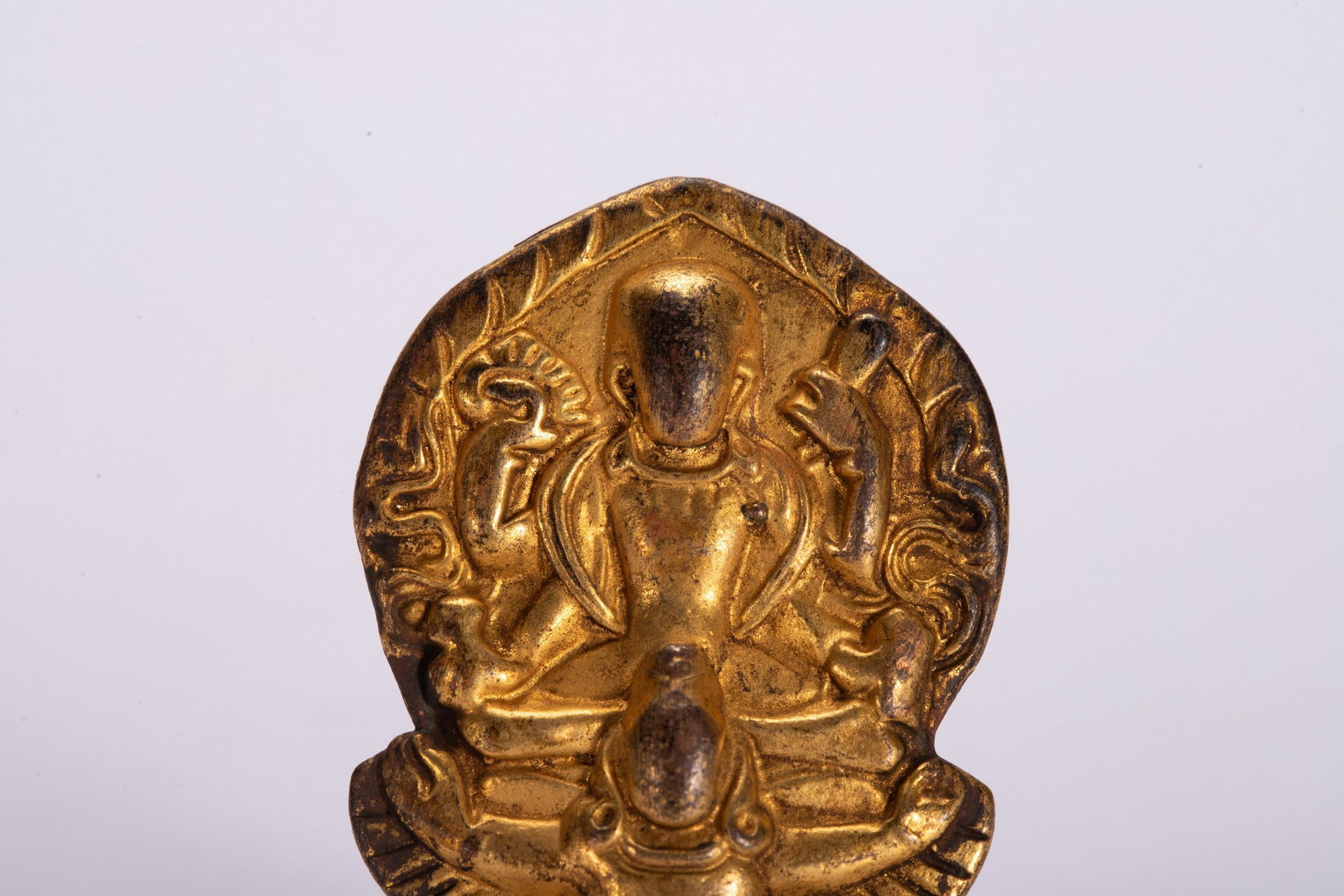 A COPPER GILDED PENDANT - 2