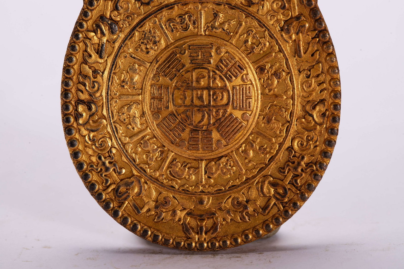 A COPPER GILDED PENDANT - 4
