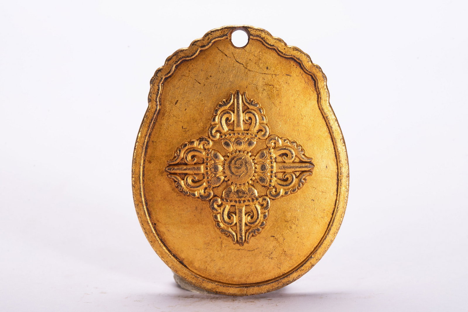 A COPPER GILDED PENDANT - 5