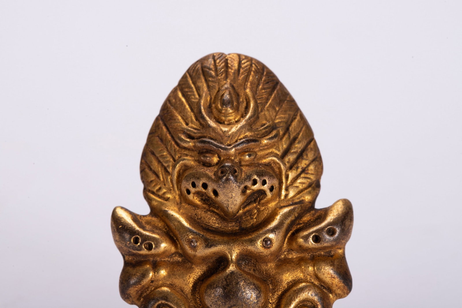 A COPPER GILDED PENDANT - 2