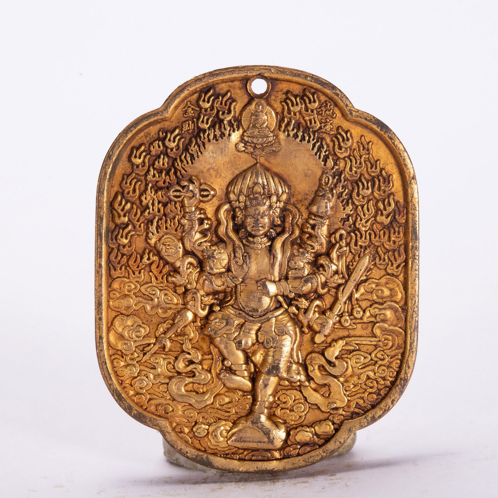A COPPER GILDED PENDANT: 铜鎏金牌子 A copper gilded pendant 5.5x4cm
