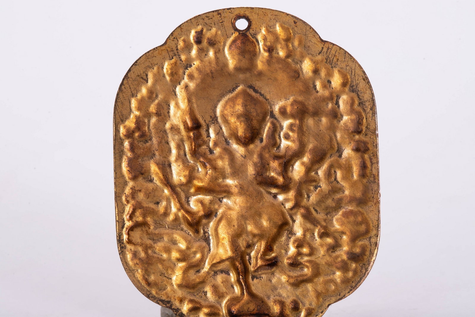A COPPER GILDED PENDANT - 6