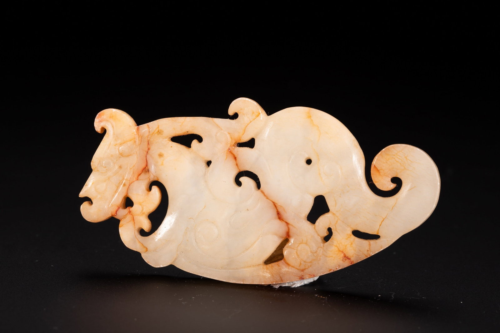 A JADE PENDANT: 和田玉螭虎纹玉佩 A jade pendant 7.5x4cm
