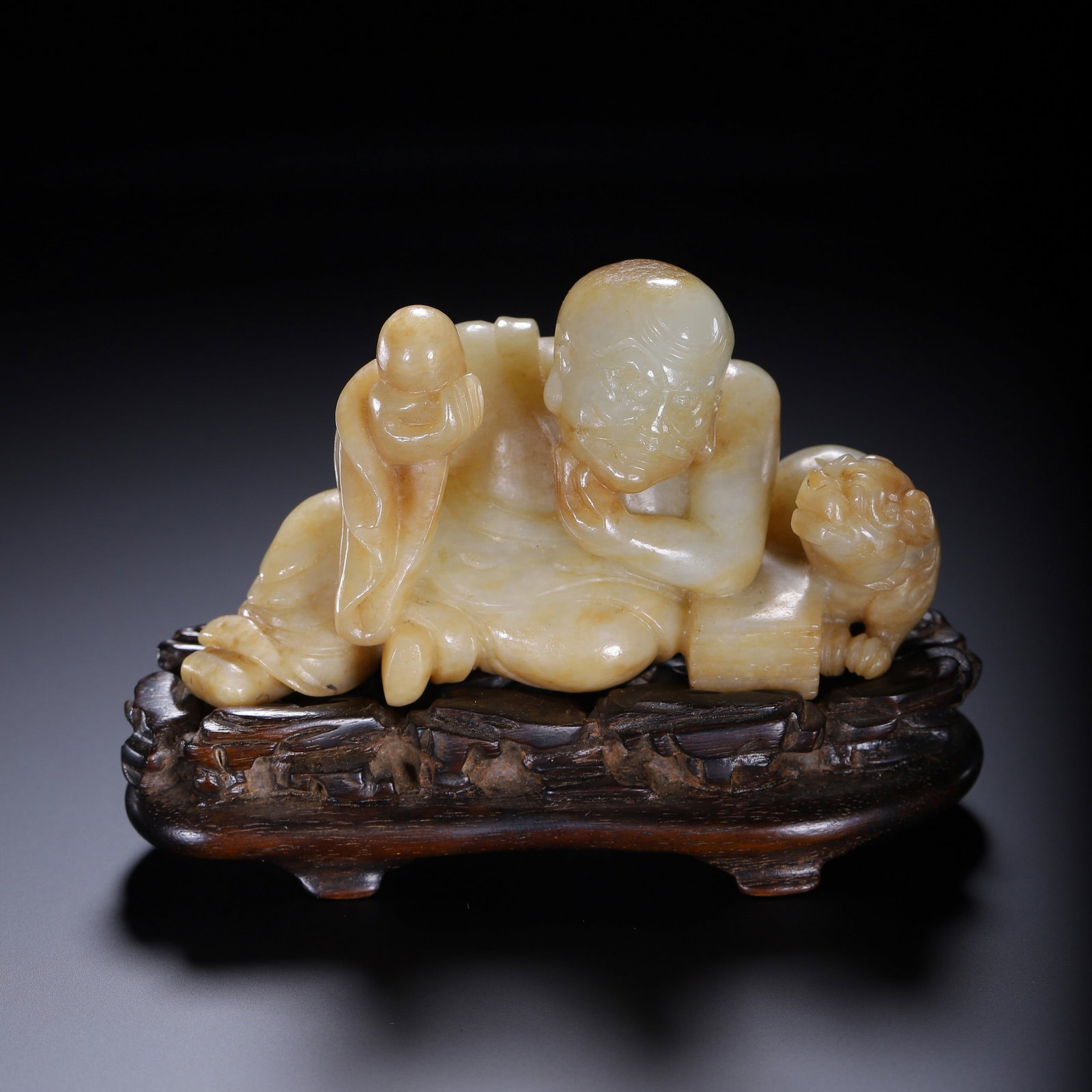 A JADE FIGURE: 玉罗汉摆件 A jade figure Ht.7.5cm