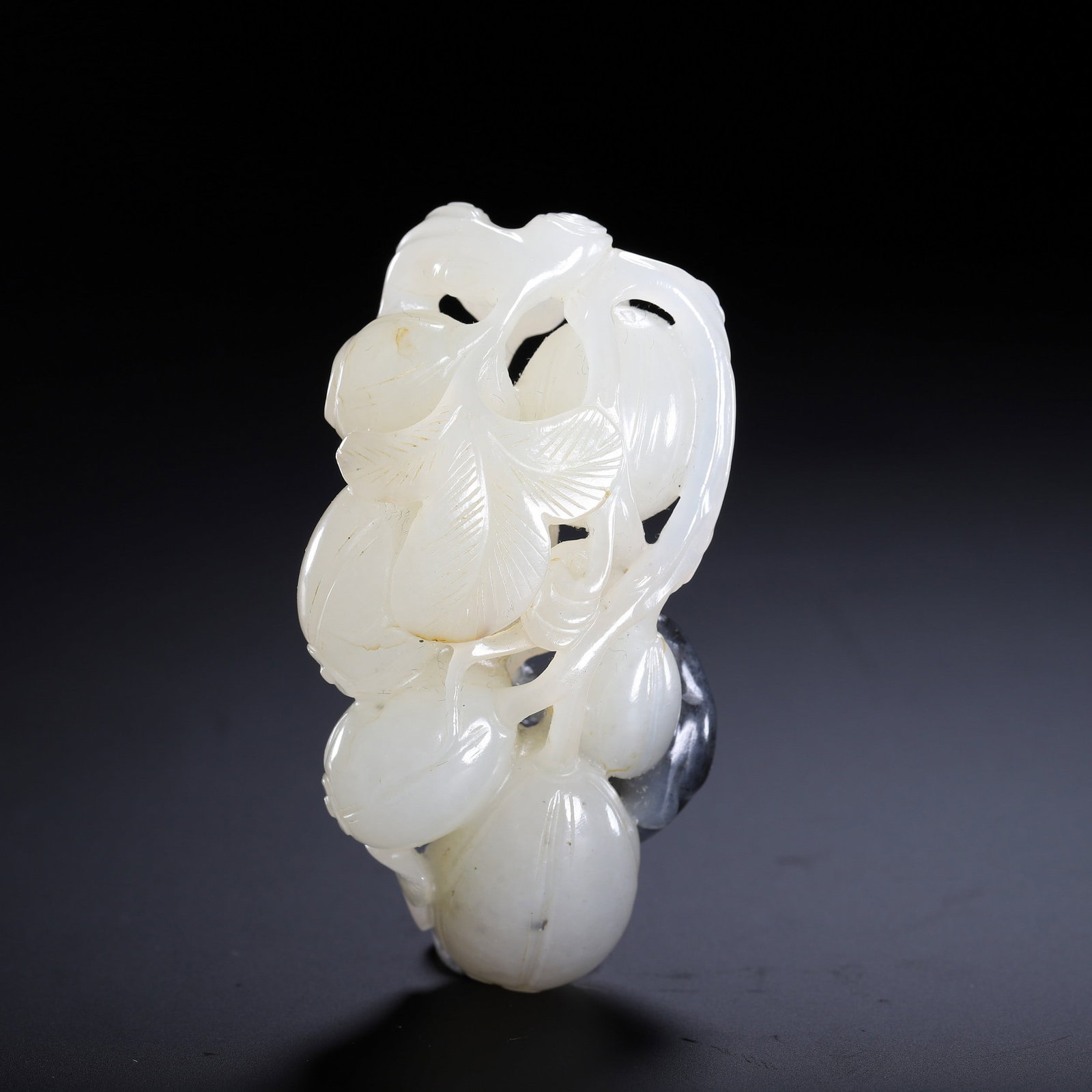 A JADE PENDANT: 白玉挂件 A jade pendant Lg.6.5cm