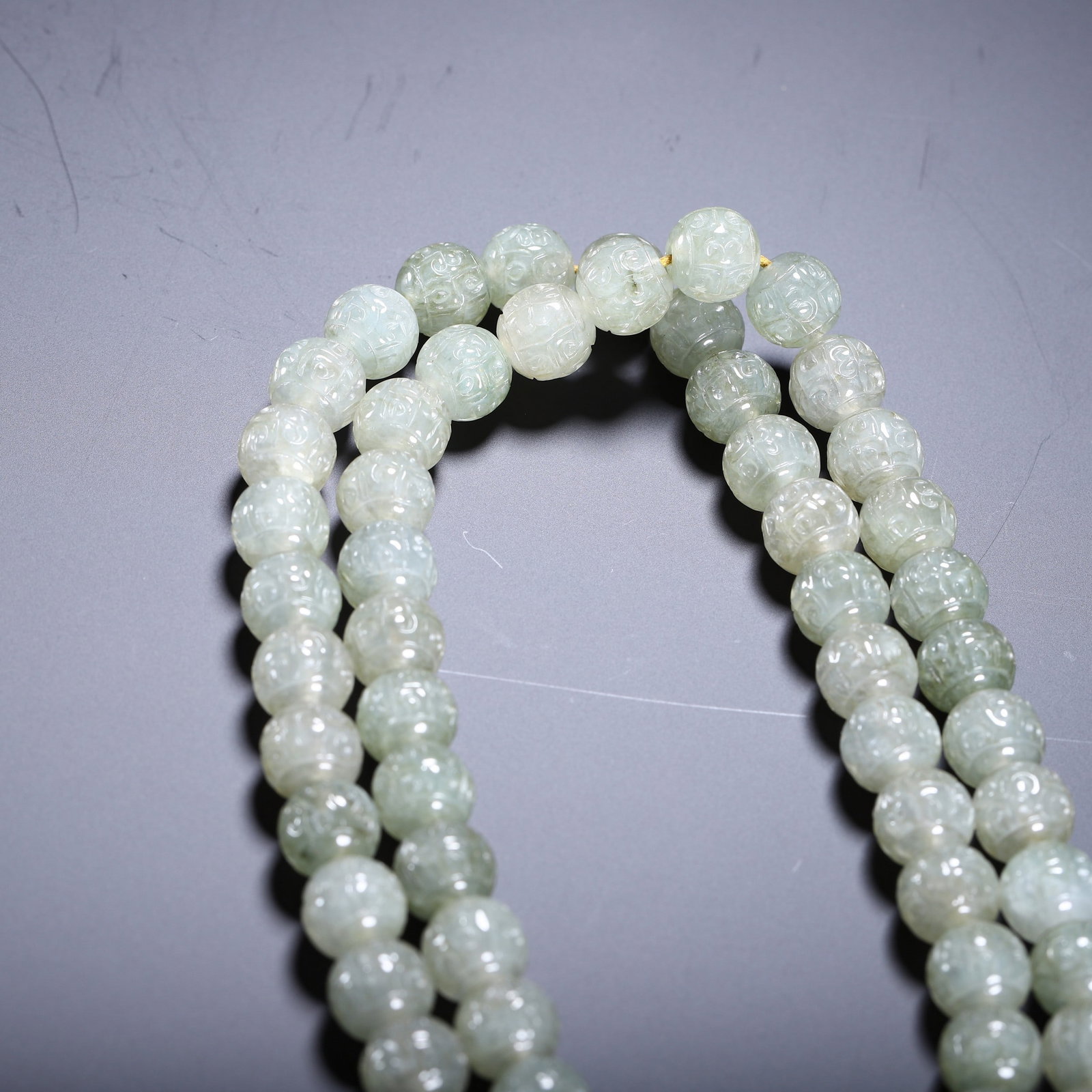 A JADE PRAYER BEAD - 3