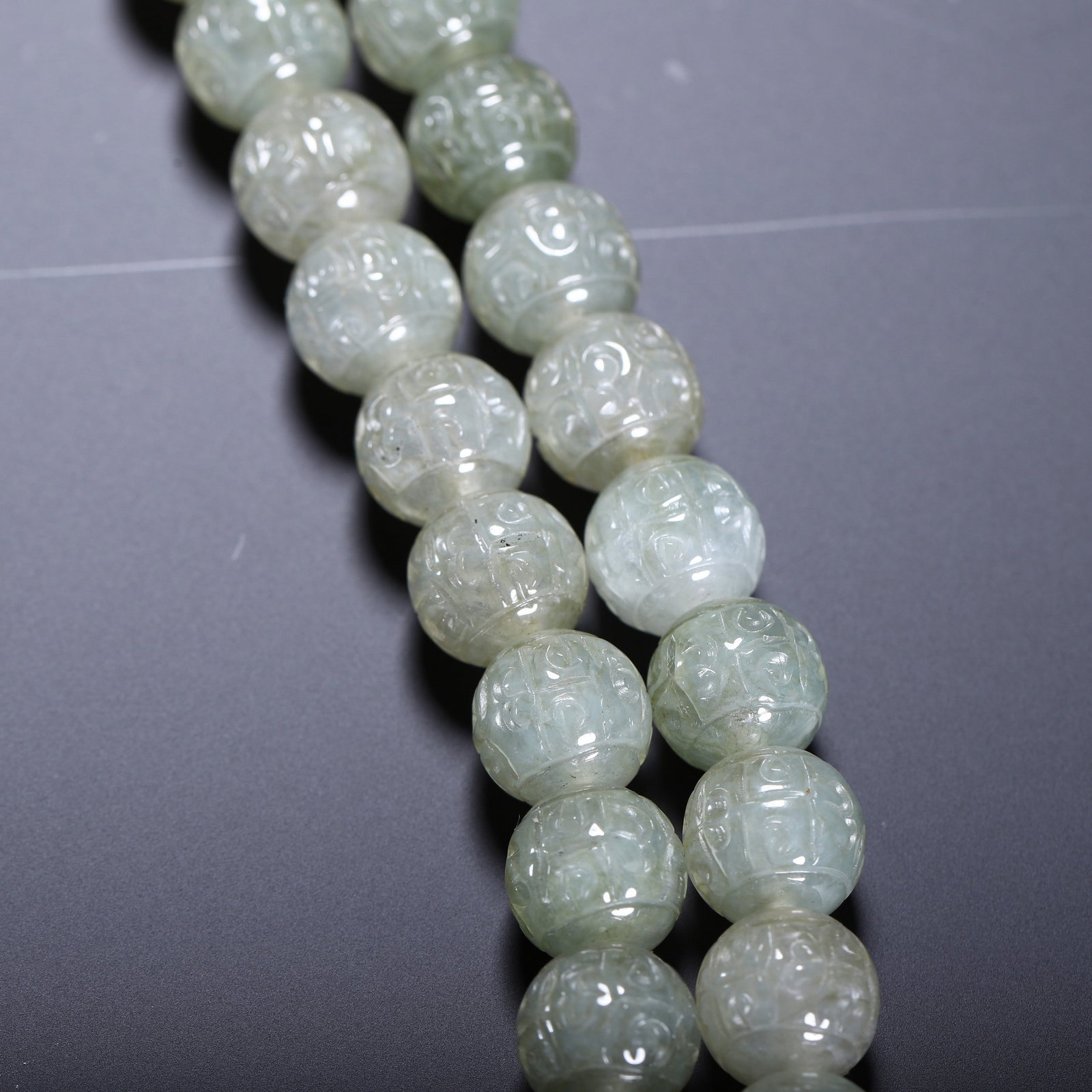 A JADE PRAYER BEAD - 7