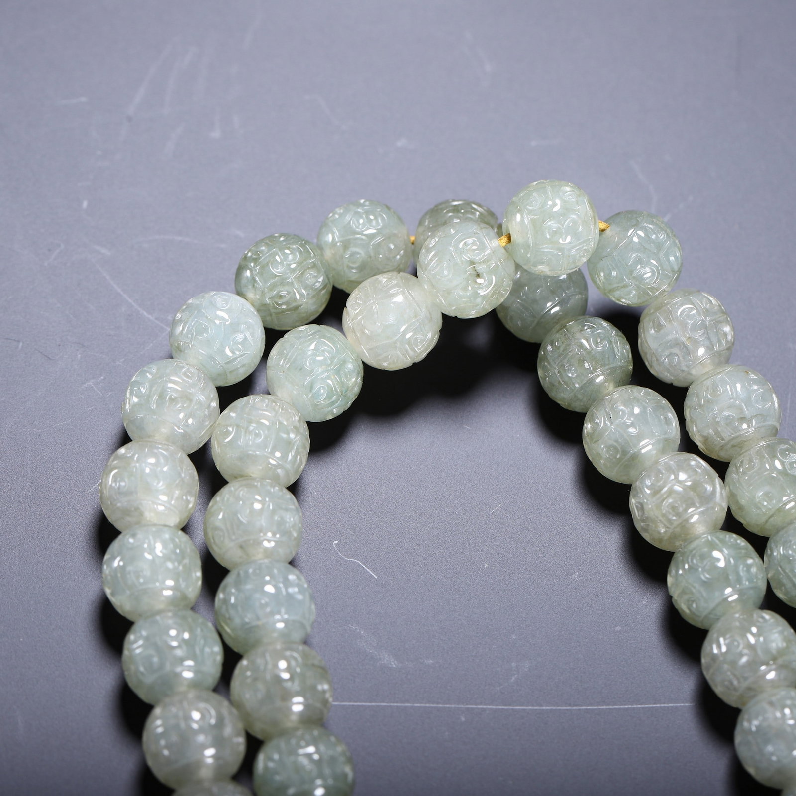 A JADE PRAYER BEAD - 9