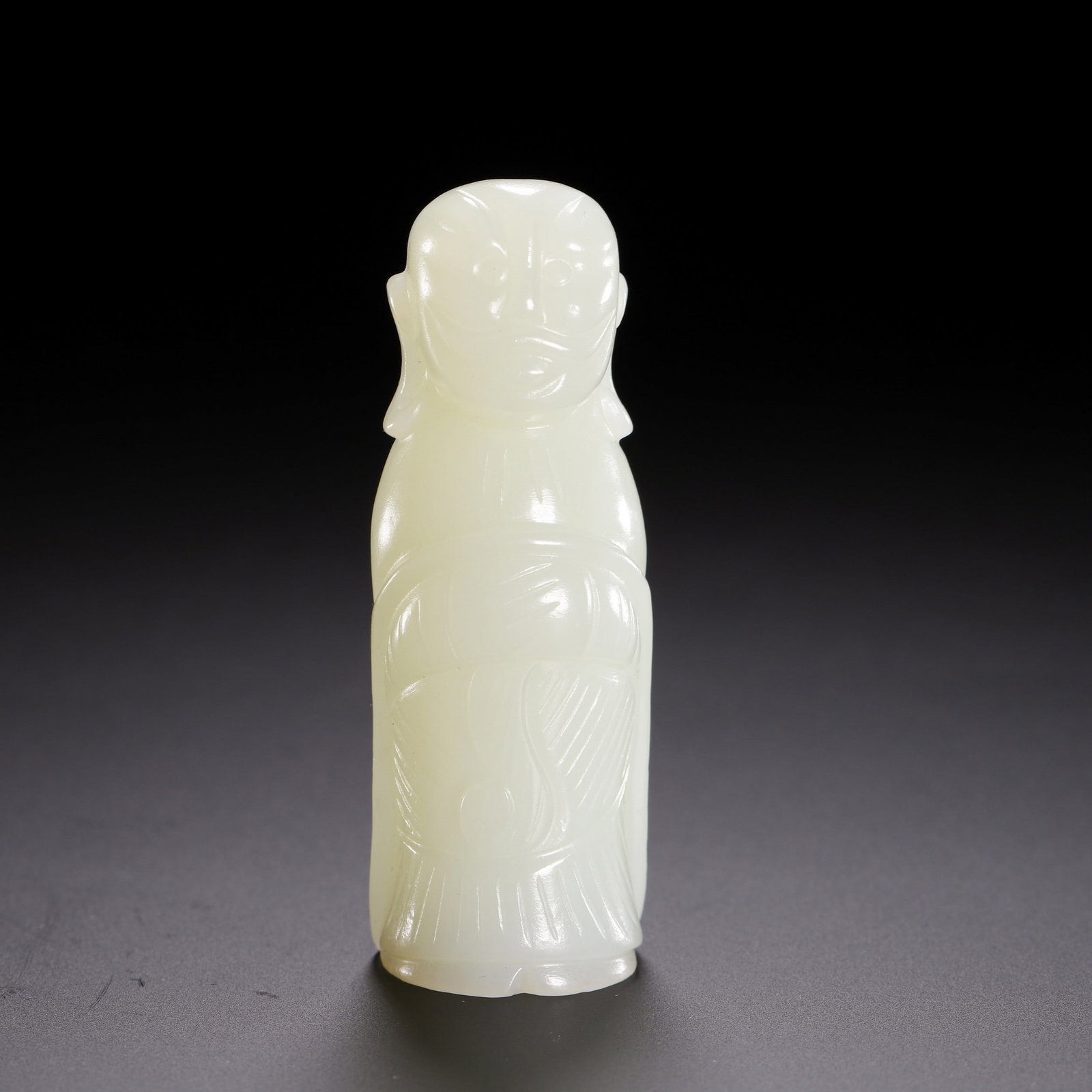 A JADE: 白玉胡人勒子 A jade Ht.6cm
