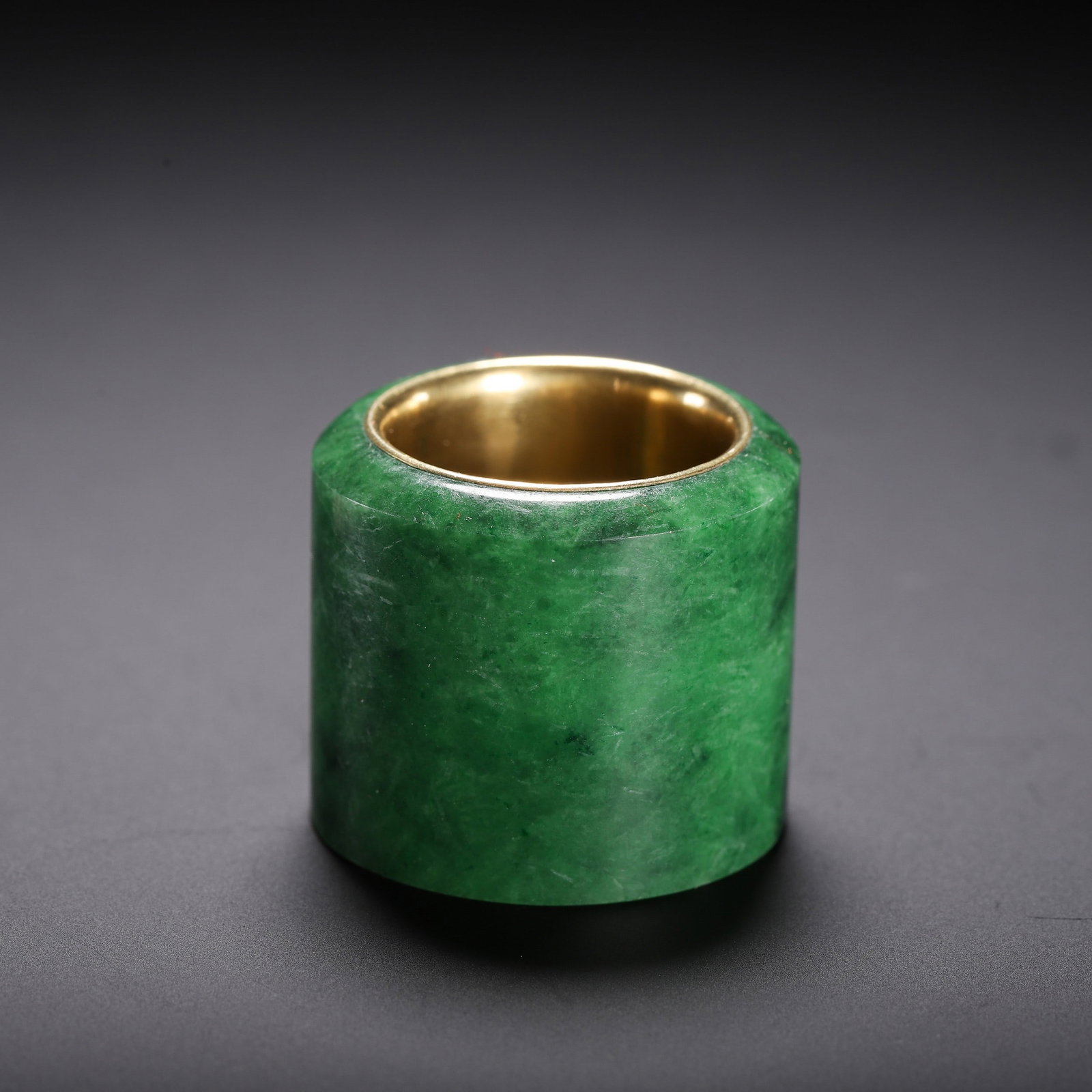 A JADE FINGERSTALL: 翡翠扳指 A jade Fingerstall 3x3x3cm