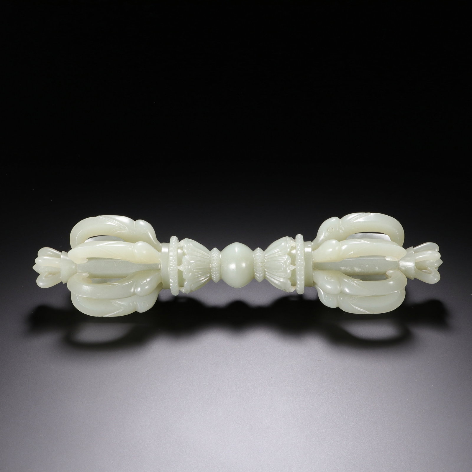 A JADE RITUAL IMPLEMENT: 和田玉法器 A jade ritual implement Lg.18.5cm
