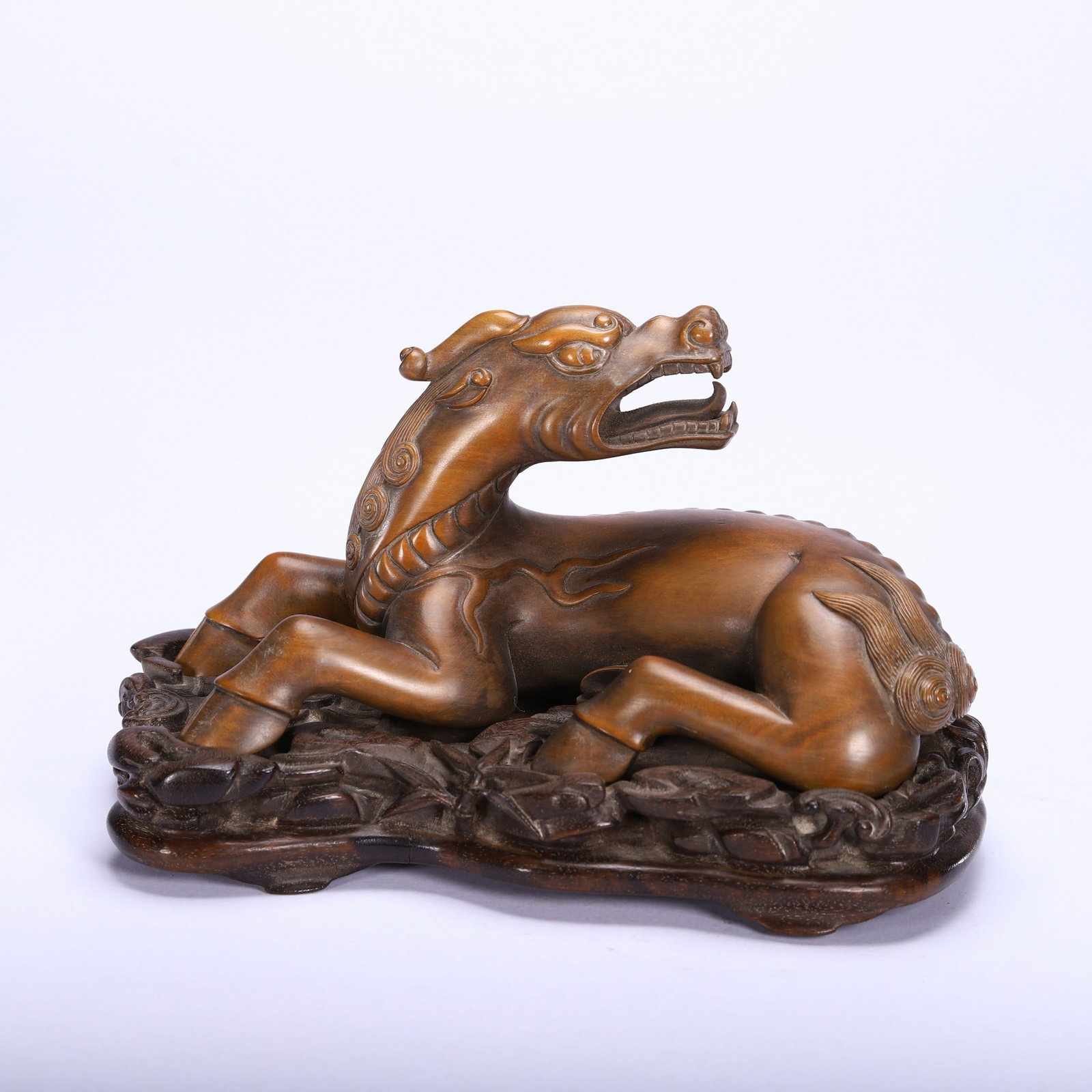 A HUANGYANG BEAST: 黄杨木瑞兽 A huangyang beast Lg.17cm
