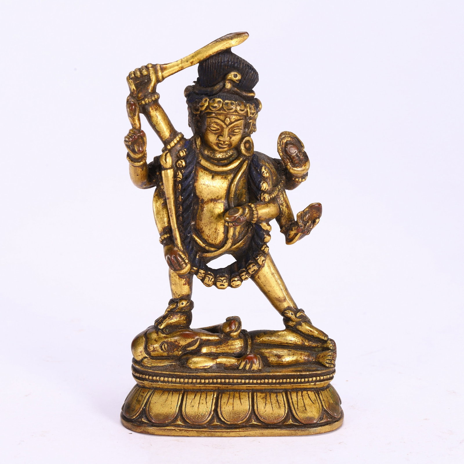 A COPPER GILDED BUDDHA STATUE: 铜鎏金佛像 A copper gilded Buddha statue Ht.10cm