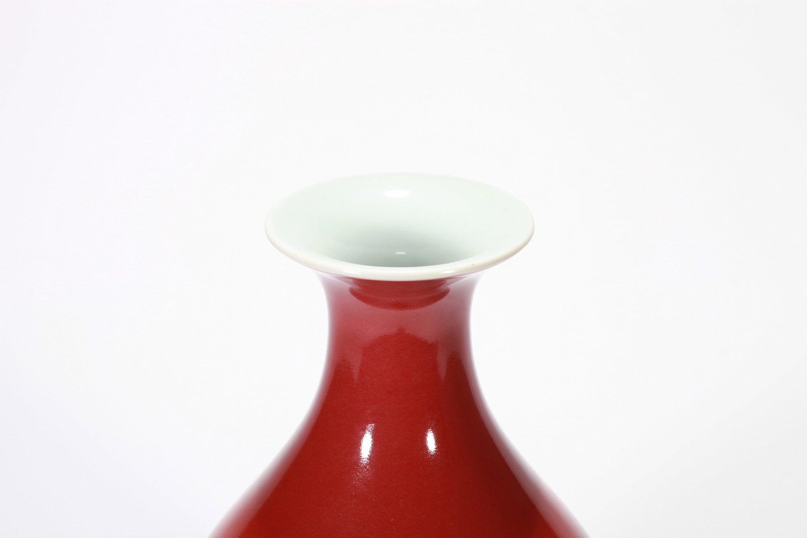 A RED GLAZED VASE - 5