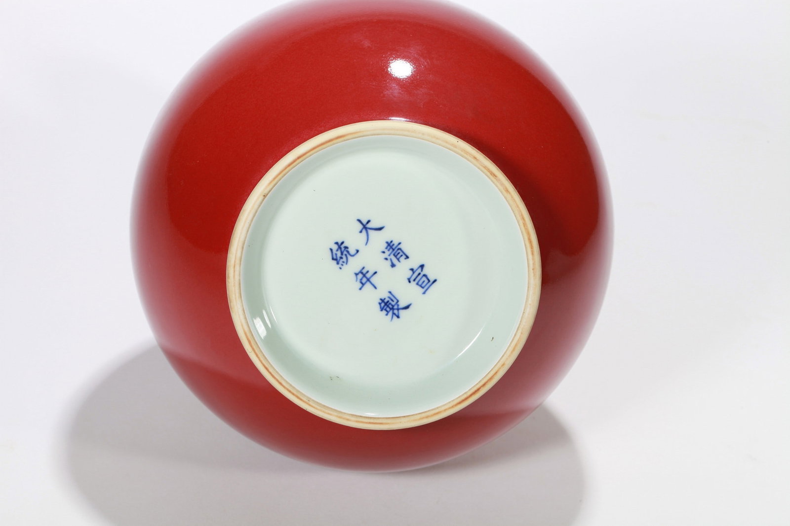 A RED GLAZED VASE - 7