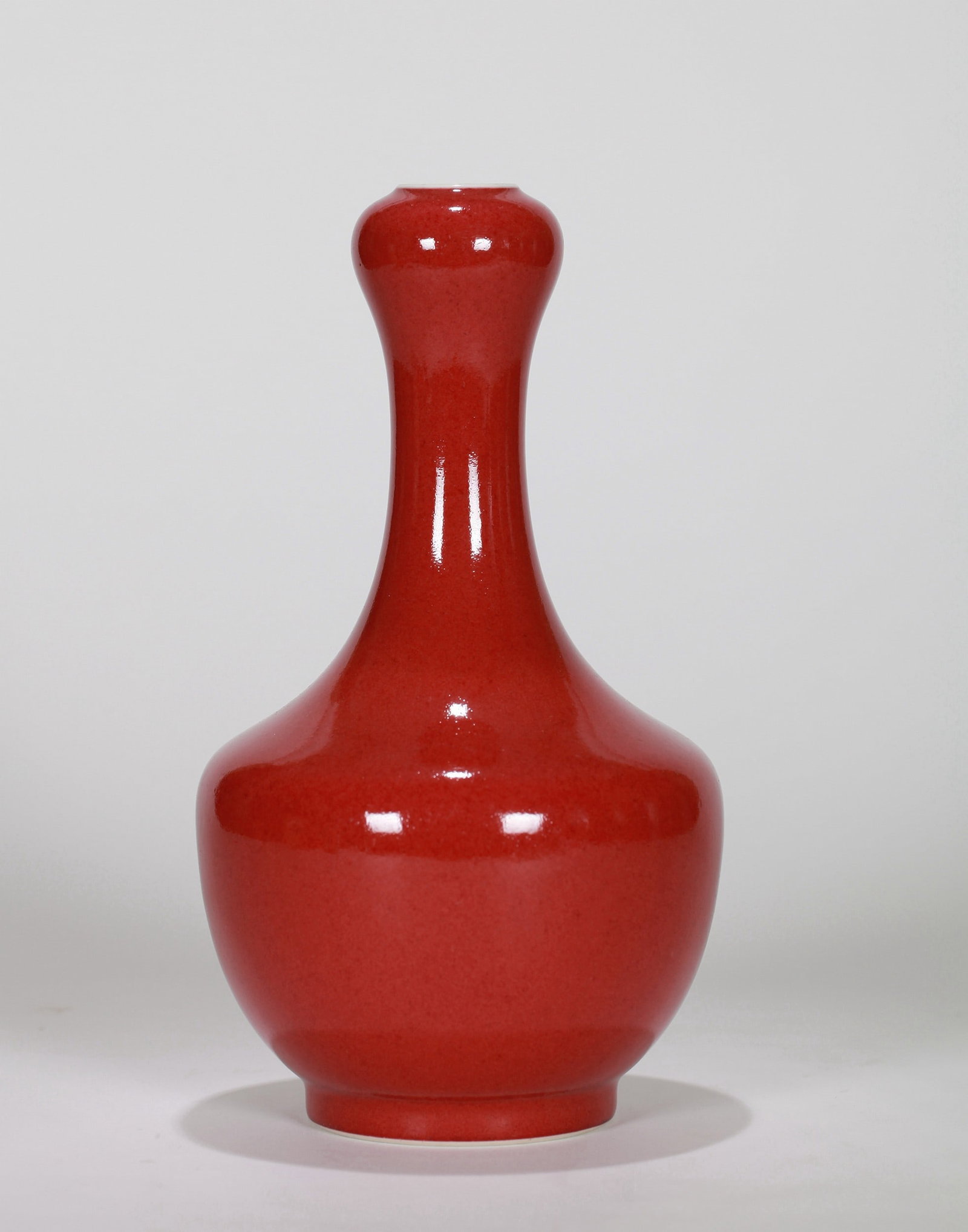 A RED GLAZED VASE - 5