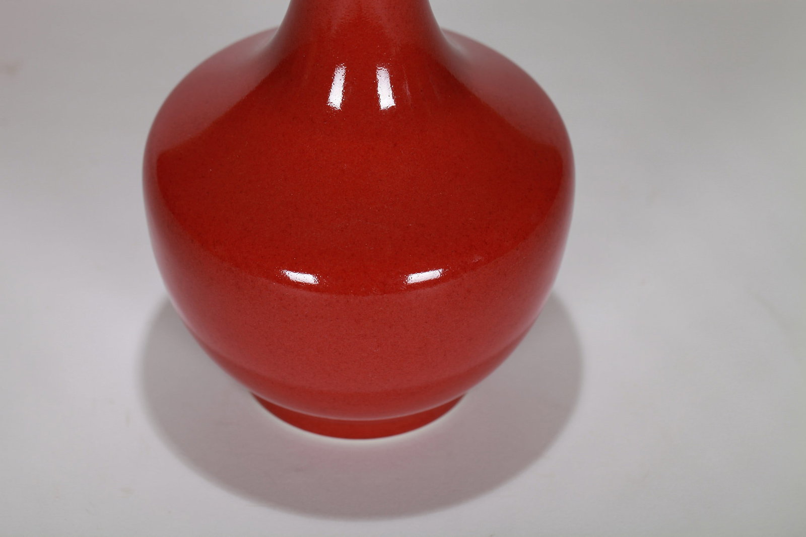 A RED GLAZED VASE - 7